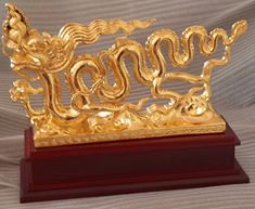 Rồng thời lý mạ vàng